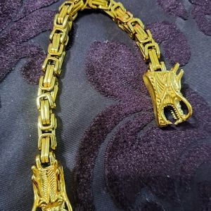 Men's handle .stainless steel plated 14k gold.